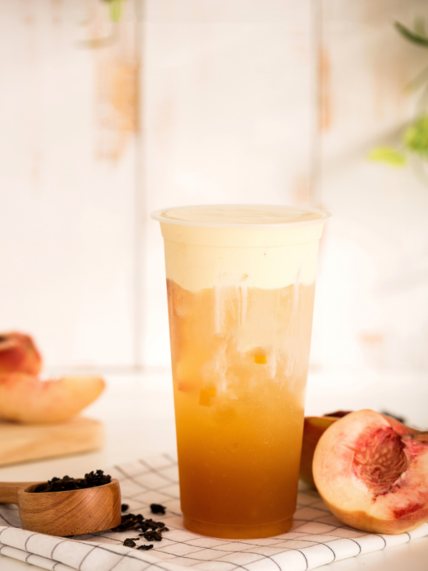 夏季高顏值冰涼桃子奶蓋果茶果汁飲品