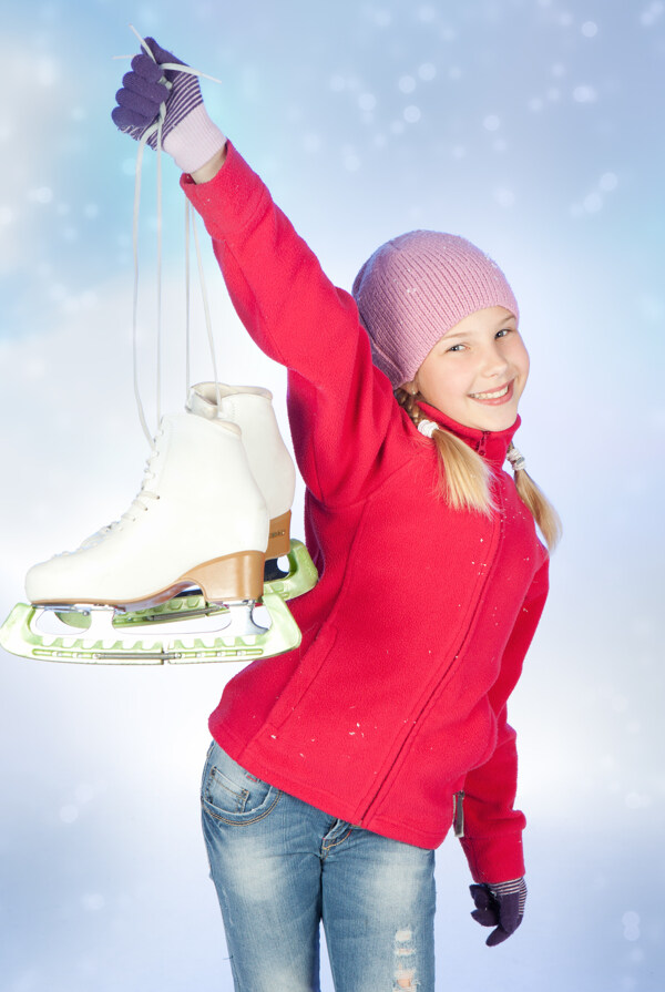 提着溜冰鞋的女孩图片