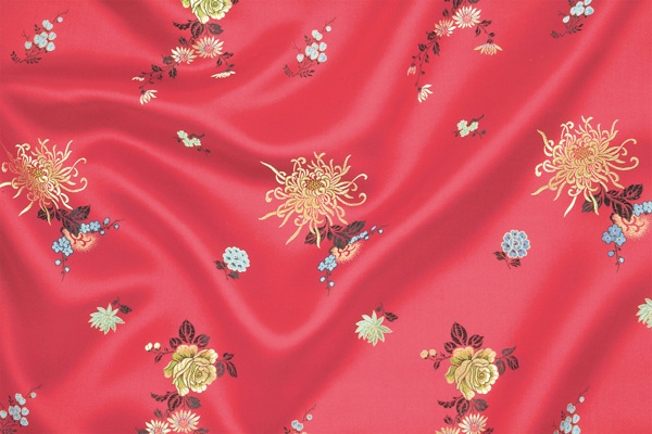 红色喜庆刺绣褶皱布料背景素材填充背景